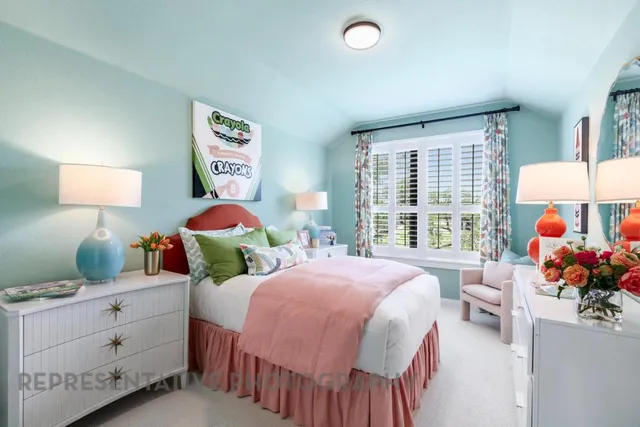 a bedroom with two beds and a window