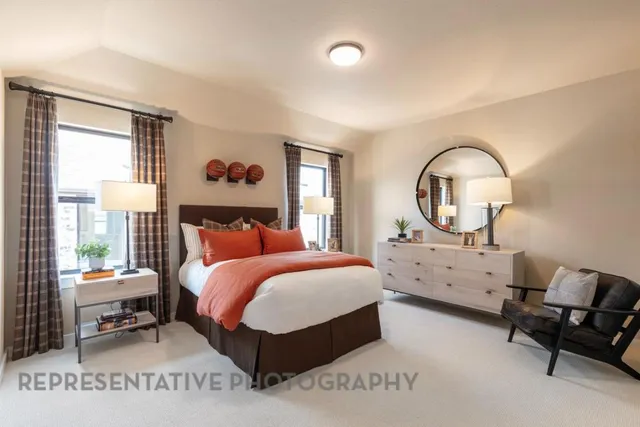 a bed room with a bed and a mirror