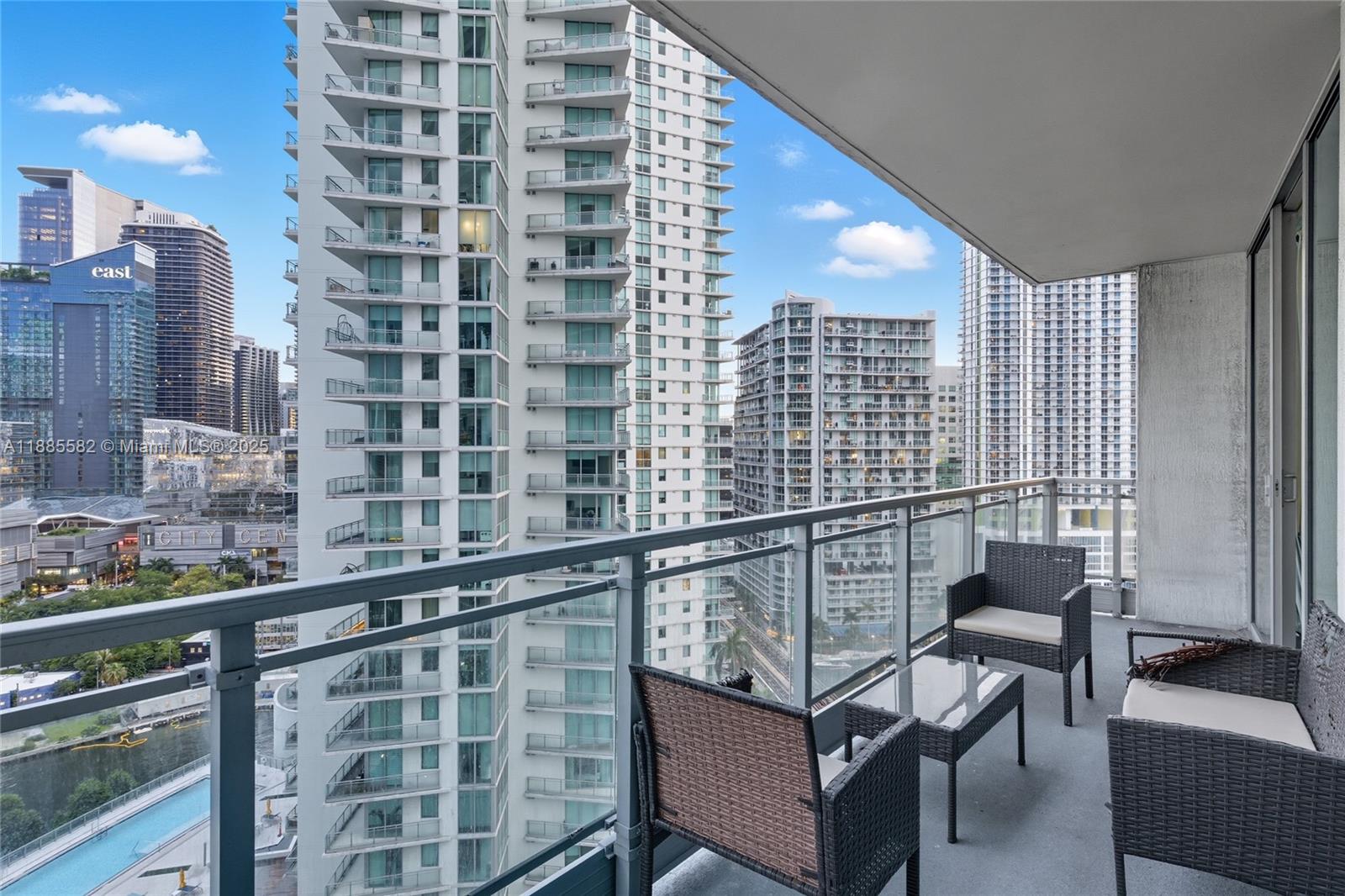90 Southwest 3rd Street, Unit 2214 Miami, FL 33130 - Photo 9 of 9 a view of a balcony with chairs