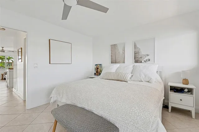 a room with a bed and a cabinets