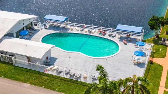 a view of a balcony with wooden floor