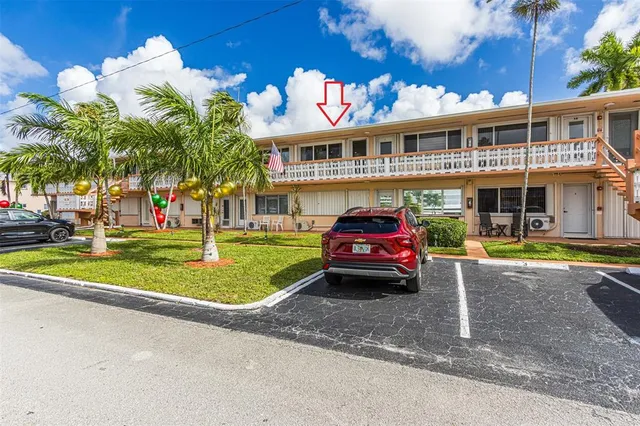 a cars parked in front of a building