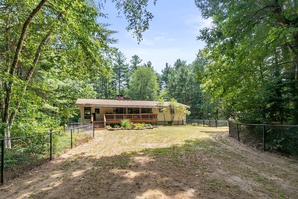 96 Old Mill Road Harvard, MA 01451 - Photo 27 of 32 a view of house with yard outdoor seating and green space