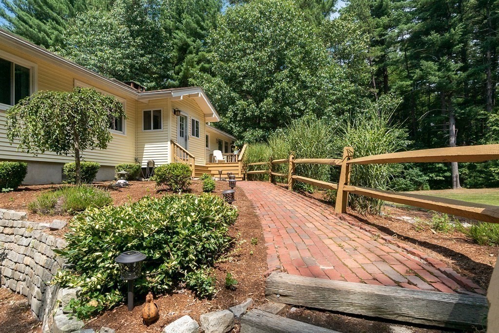 96 Old Mill Road Harvard, MA 01451 - Photo 5 of 32 a view of house with a yard