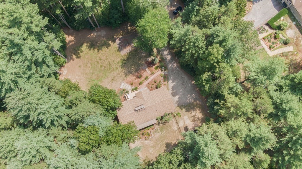 96 Old Mill Road Harvard, MA 01451 - Photo 8 of 32 an aerial view of residential house with outdoor space and trees around
