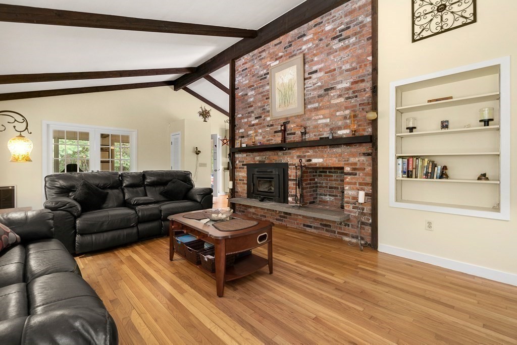 96 Old Mill Road Harvard, MA 01451 - Photo 9 of 32 a living room with furniture and a fireplace