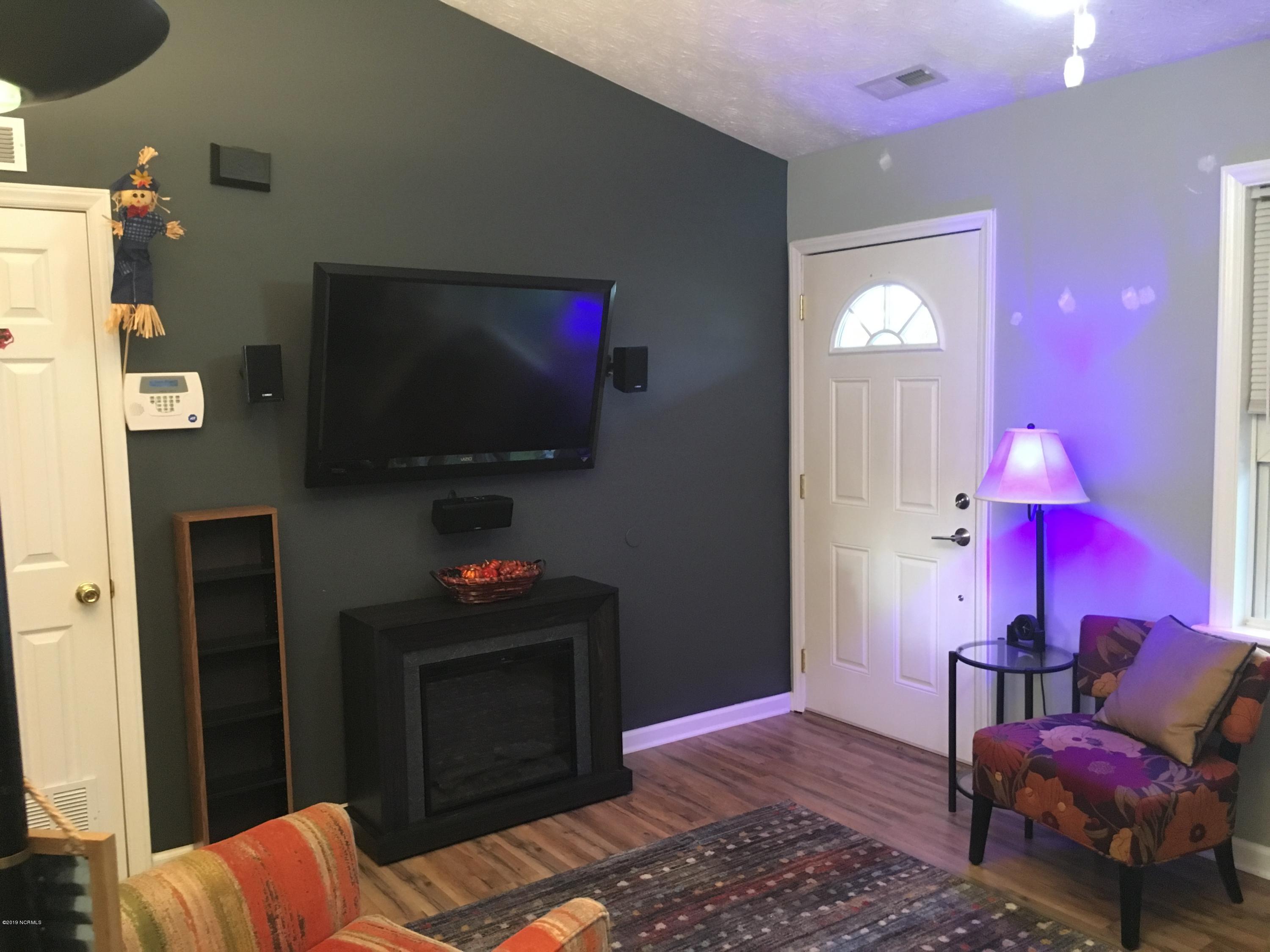 215 Foxhall Road Newport, NC 28570 - Photo 3 of 20 Front Entrance and TV with surround sound