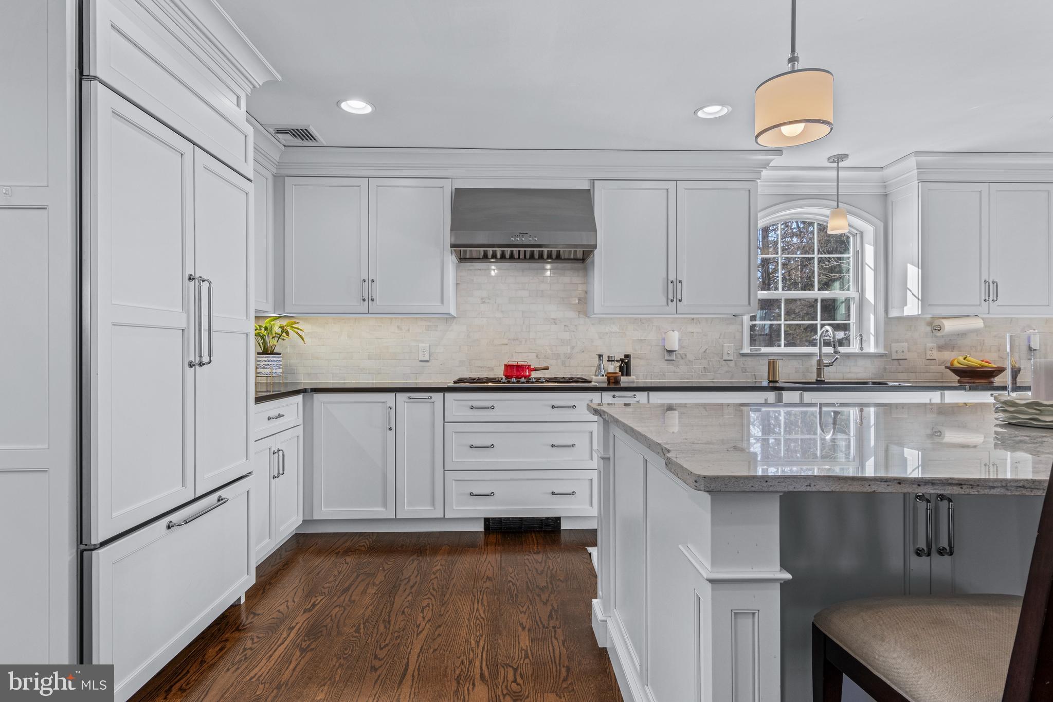 1012 Waltham Road Berwyn, PA 19312 - Photo 11 of 55 a kitchen with stainless steel appliances granite countertop a sink stove and refrigerator