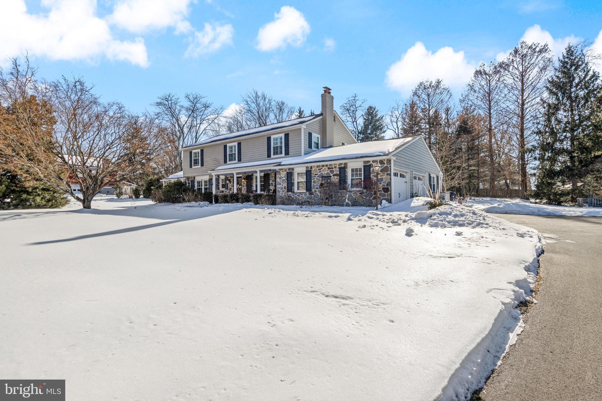 1012 Waltham Road Berwyn, PA 19312 - Photo 2 of 55 a view of a house with snow on the road