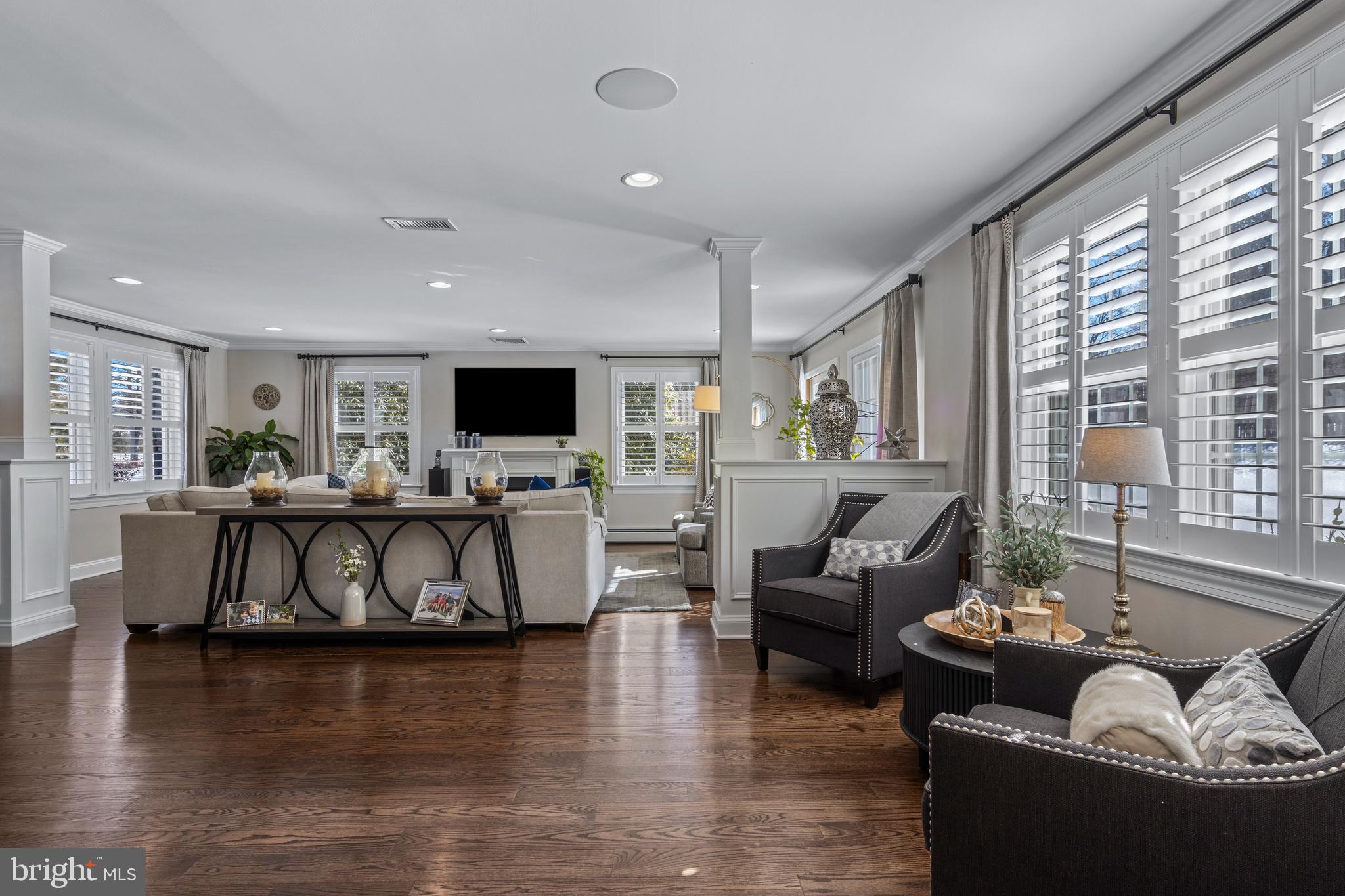 1012 Waltham Road Berwyn, PA 19312 - Photo 25 of 55 a living room with fireplace furniture and a flat screen tv