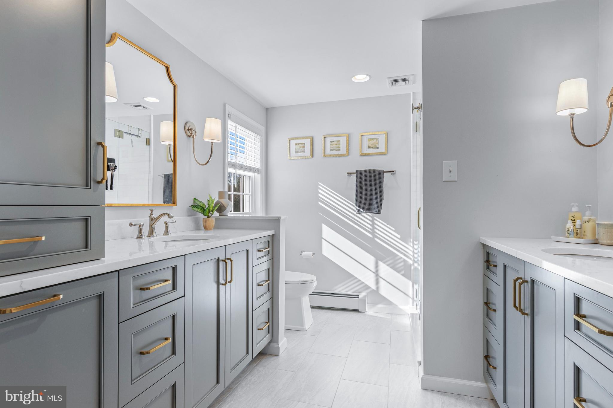 1012 Waltham Road Berwyn, PA 19312 - Photo 41 of 55 a spacious bathroom with a sink a vanity and a mirror