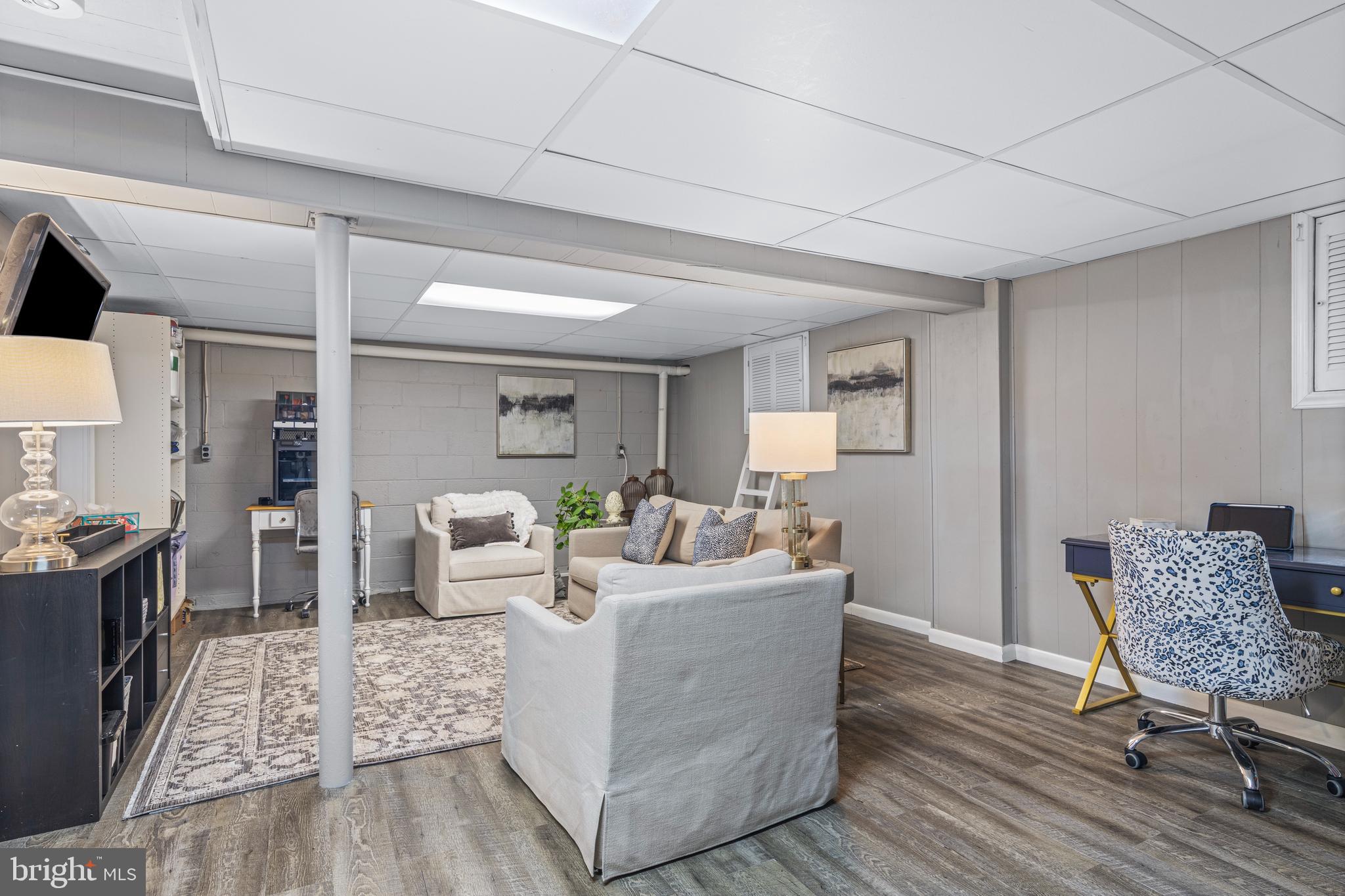 1012 Waltham Road Berwyn, PA 19312 - Photo 48 of 55 a living room with furniture and a wooden floor