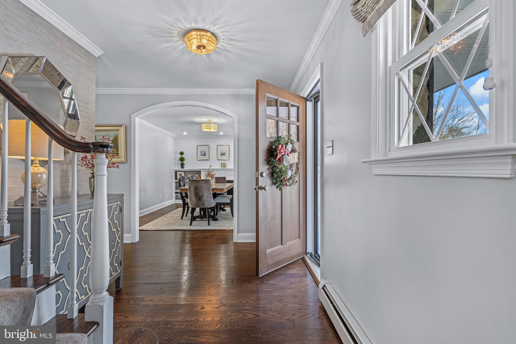1012 Waltham Road Berwyn, PA 19312 - Photo 9 of 55 a view of a hallway with wooden floor and windows