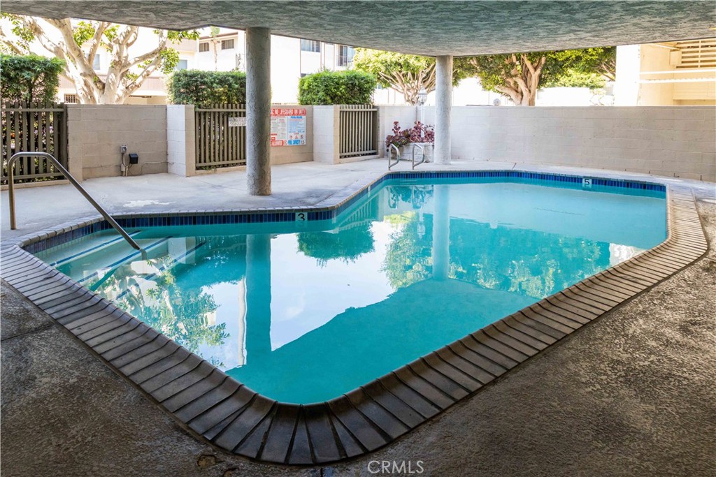 8740 Tuscany Avenue Playa del Rey, CA 90293 - Photo 17 of 21 a view of a swimming pool with a patio