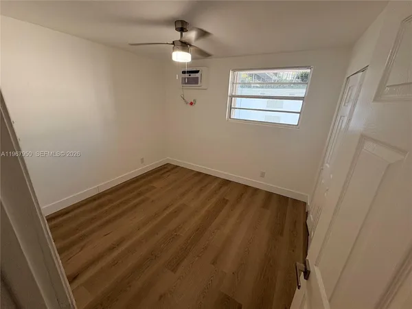 an empty room with a door