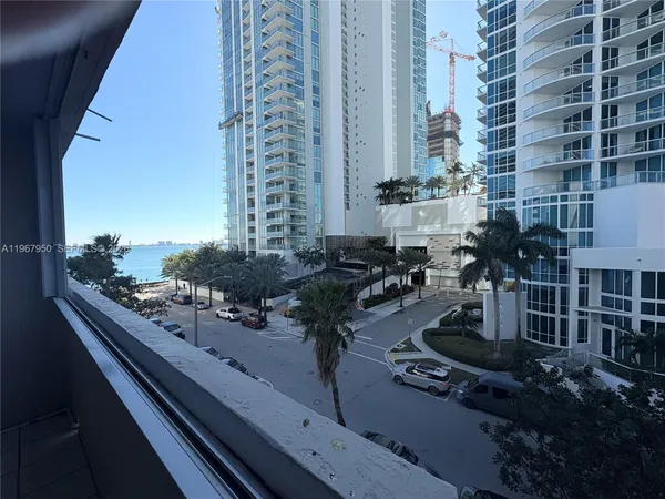 a view of a building from a balcony