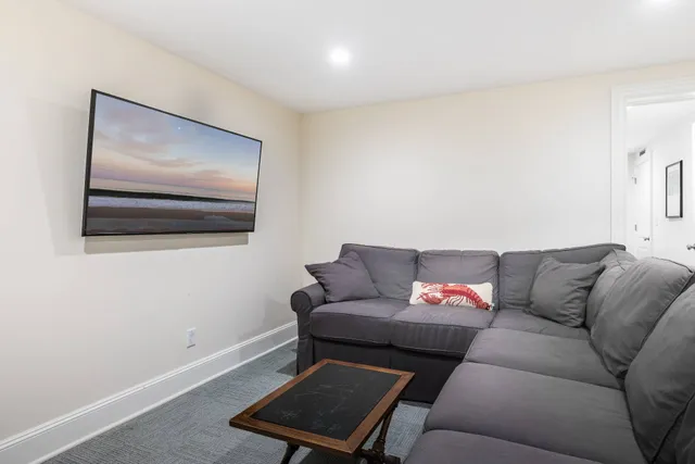 a living room with furniture and a couch