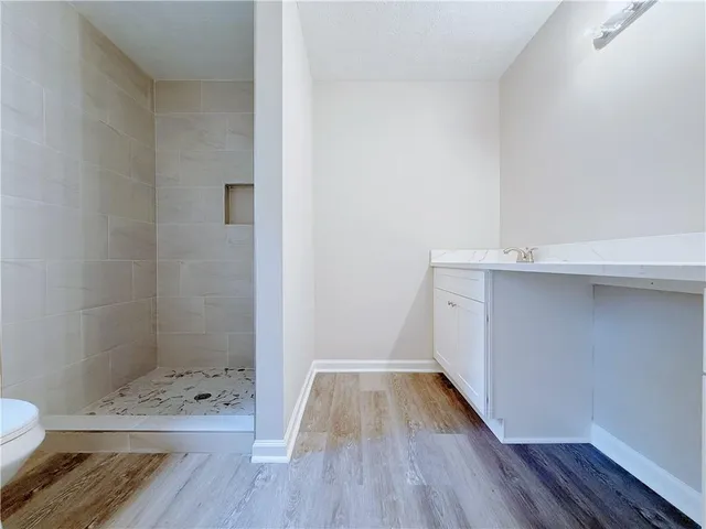 a bathroom with a sink and a toilet