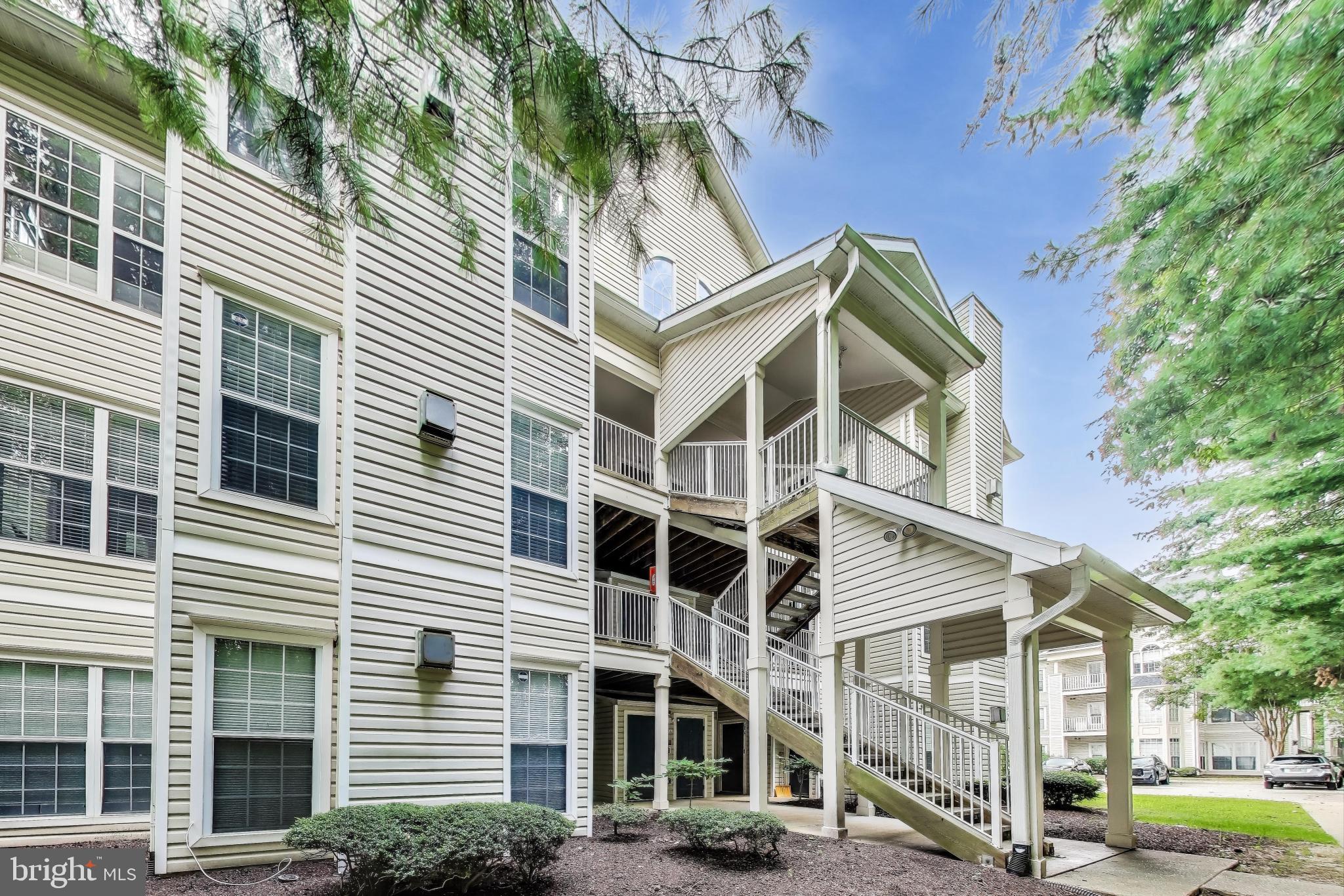 15602 Everglade Lane, Unit 2203 Bowie, MD 20716 - Photo 21 of 24 a view of a building with a street