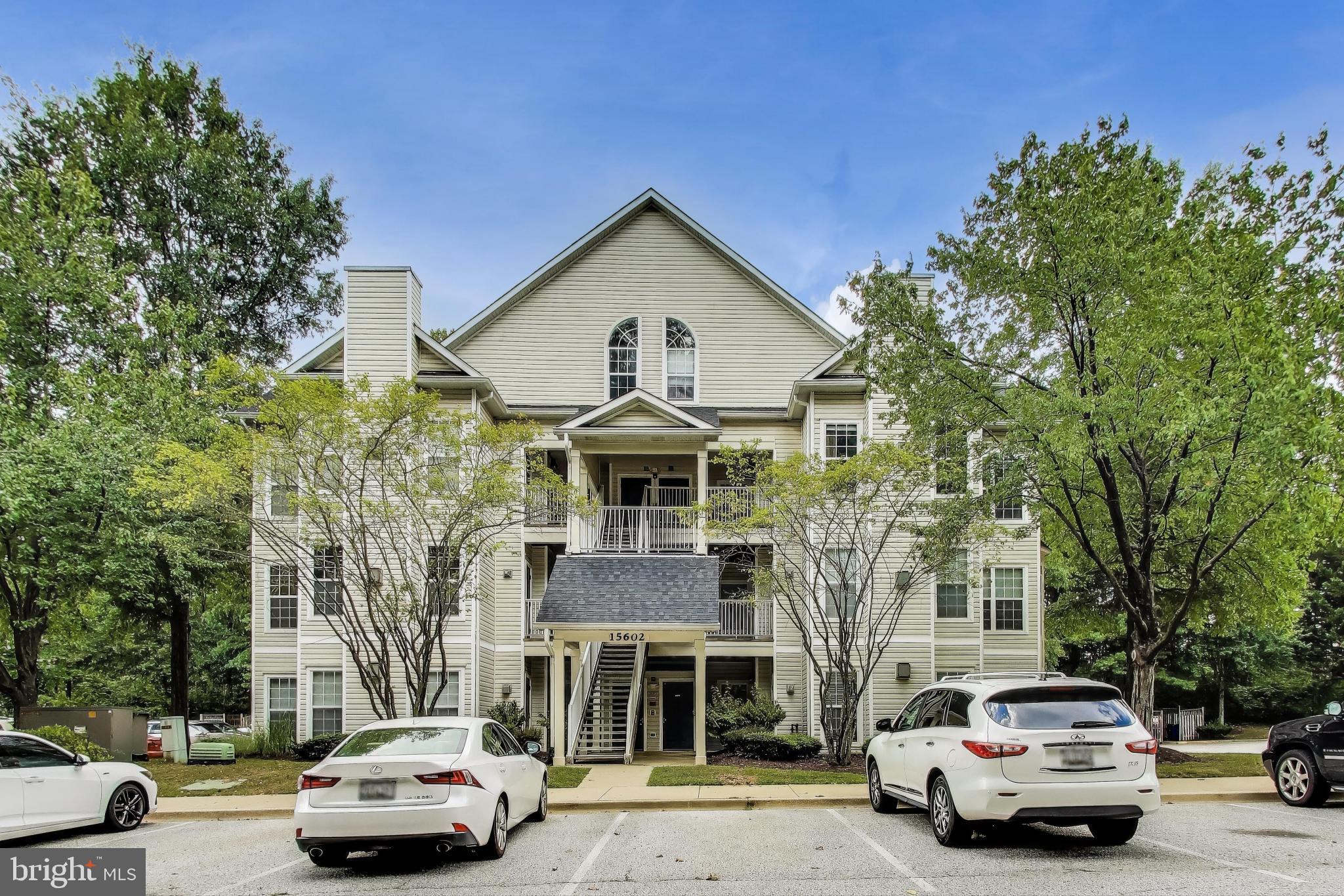 15602 Everglade Lane, Unit 2203 Bowie, MD 20716 - Photo 8 of 24 a car parked in front of a building