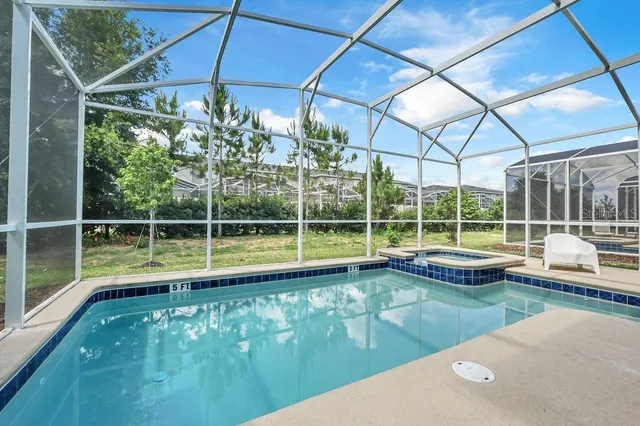 a view of a house with a swimming pool