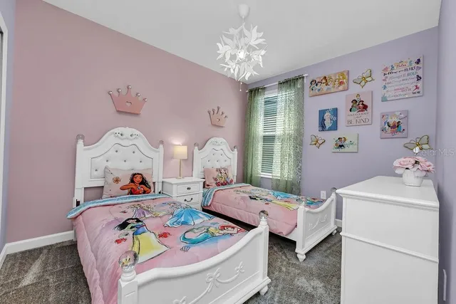 a bed room with furniture and decor