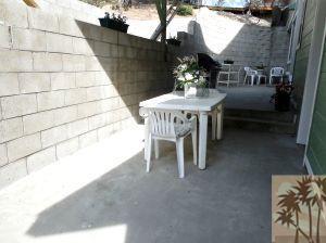 25740 Saunders Meadow Road Idyllwild, CA 92549 - Photo 16 of 16 a balcony with table and chairs
