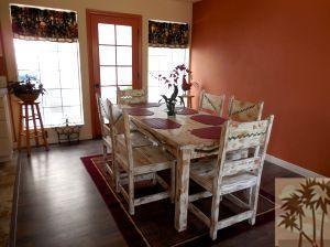 25740 Saunders Meadow Road Idyllwild, CA 92549 - Photo 5 of 16 a dining room with furniture and wooden floor