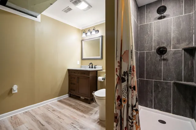 a bathroom with a sink and toilet