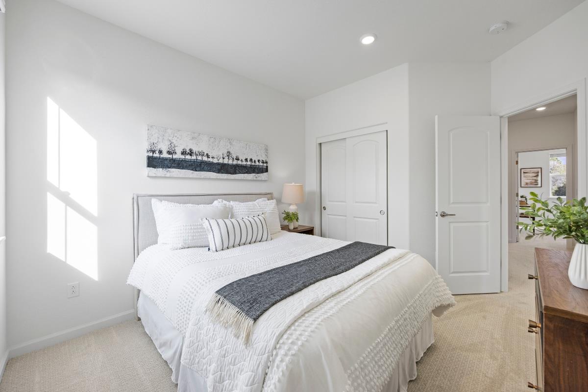 3775 Castro Valley Boulevard Castro Valley, CA 94546 - Photo 24 of 35 a bedroom with a bed and a potted plant