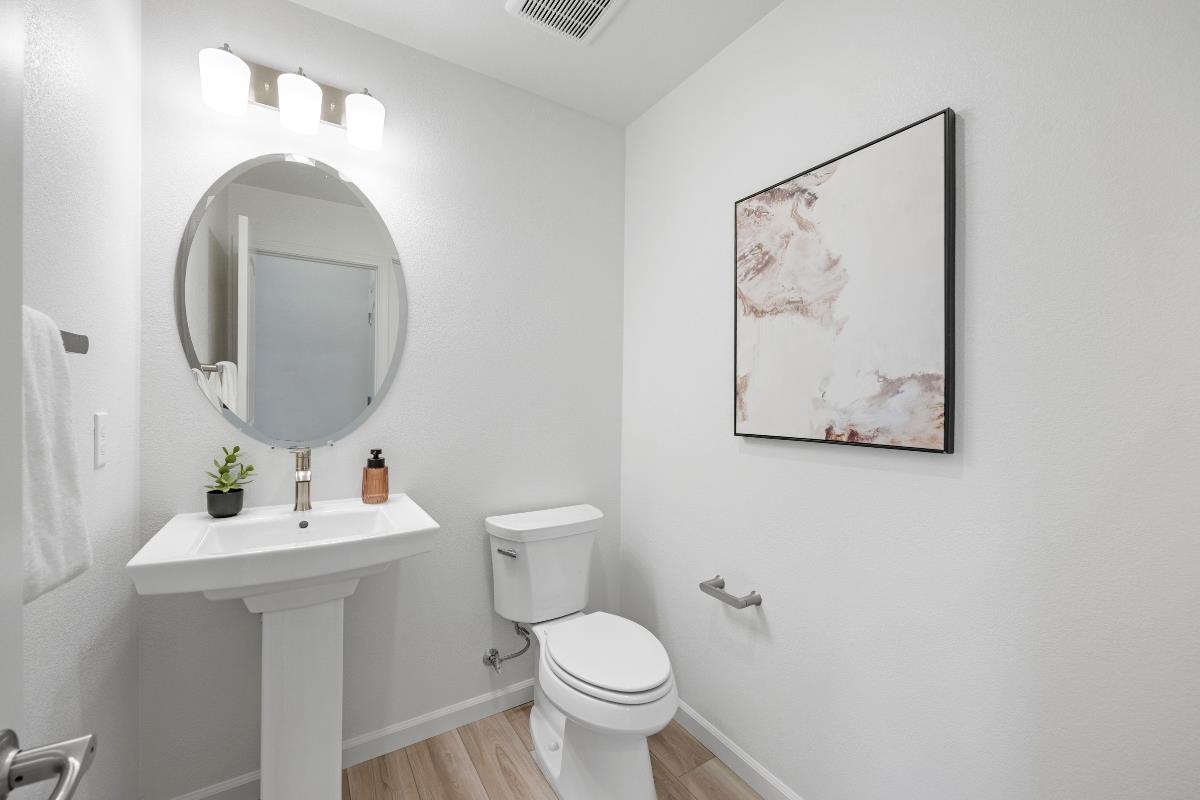 3775 Castro Valley Boulevard Castro Valley, CA 94546 - Photo 28 of 35 a bathroom with a toilet sink and mirror