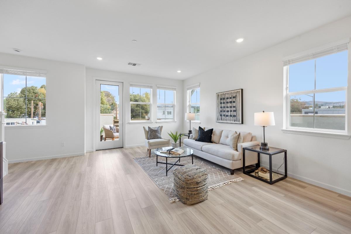 3775 Castro Valley Boulevard Castro Valley, CA 94546 - Photo 6 of 35 a living room with furniture and a wooden floor