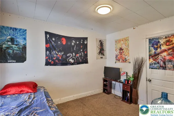 a room with furniture and wooden floor