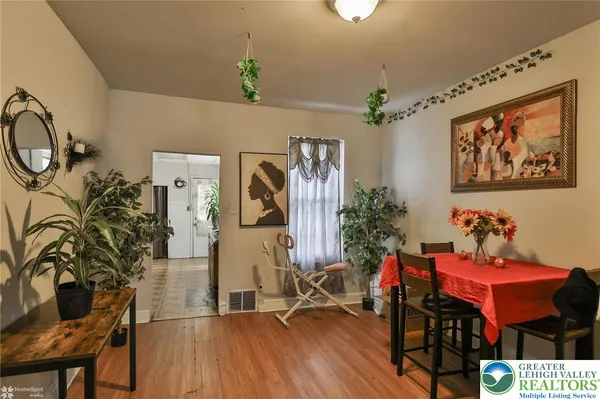 a view of entryway with wooden floor