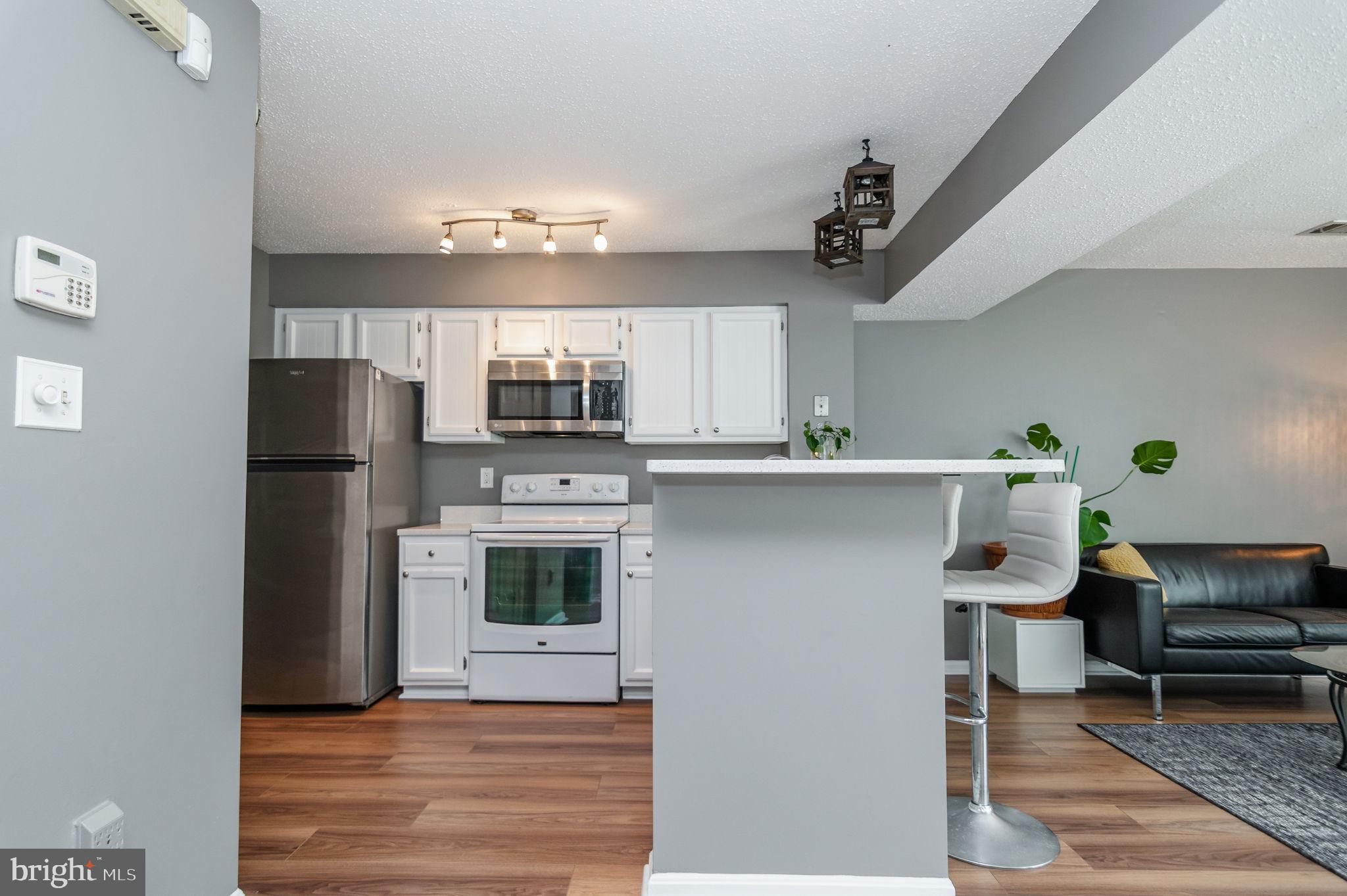 1633 Carriage House Terrace, Unit D Silver Spring, MD 20904 - Photo 13 of 25 Kitchen - 1