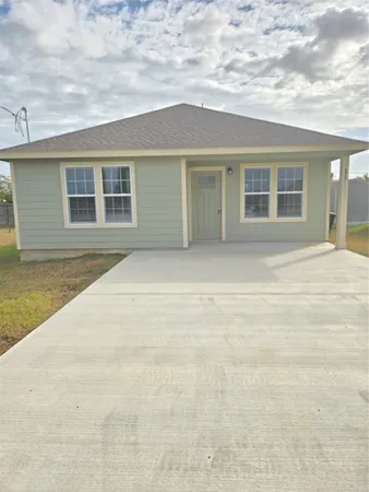 front view of house with a yard