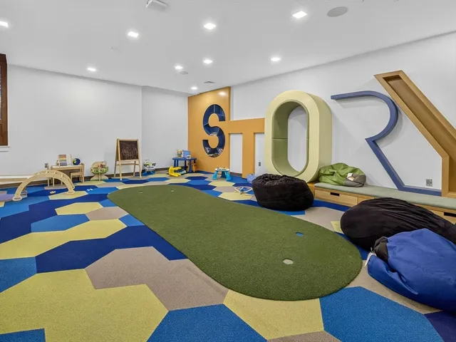 a view of a room with racks on the wall