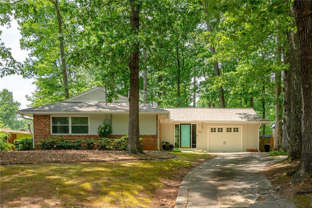 1580 Delia Drive Decatur, GA 30033 - Photo 1 of 1 a view of a house with a yard and large trees