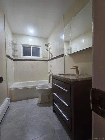 a bathroom with a sink and a bathtub