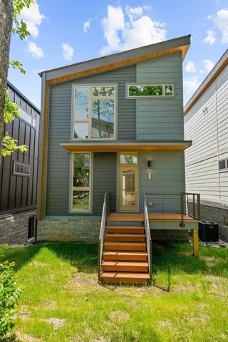 a front view of house with yard