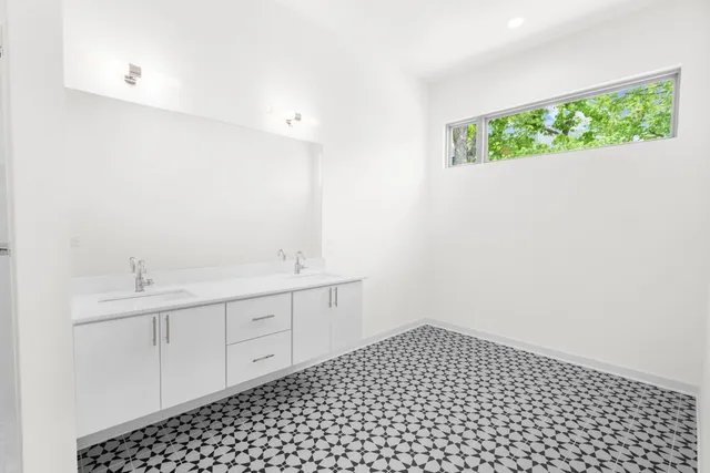 a bathroom with a sink and a vanity