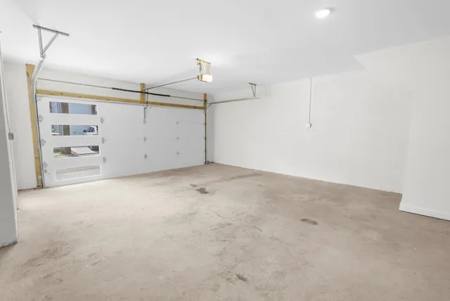 an empty room with shelves