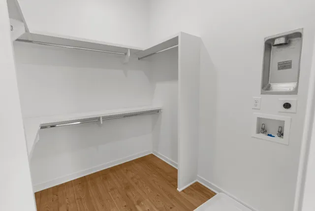 a view of an empty walk in closet