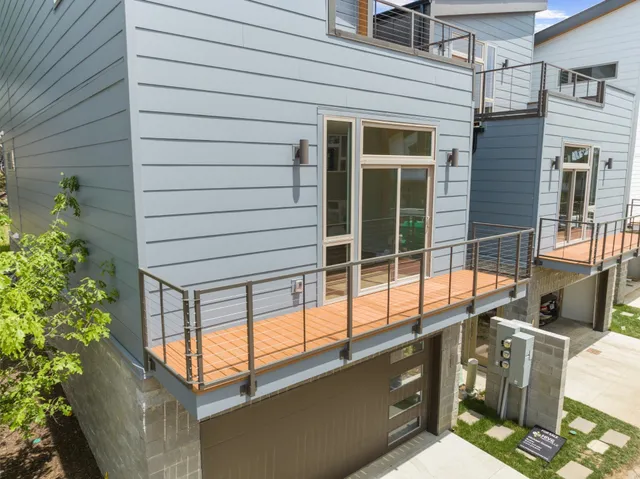 a view of balcony with a potted plant