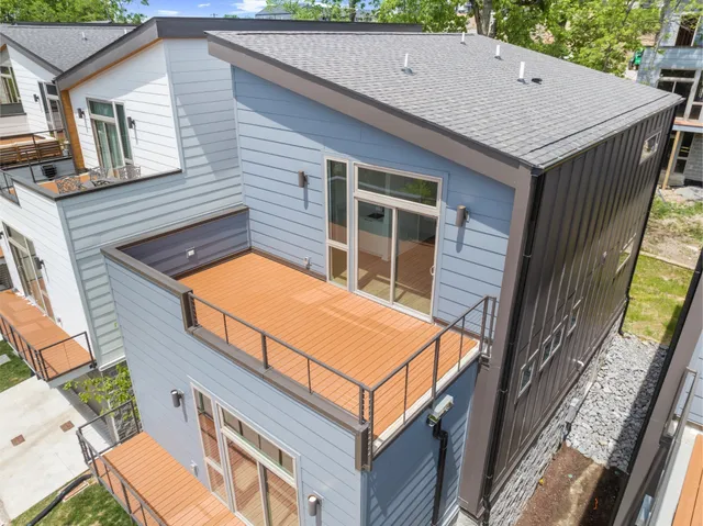 a backyard of a house with seating space
