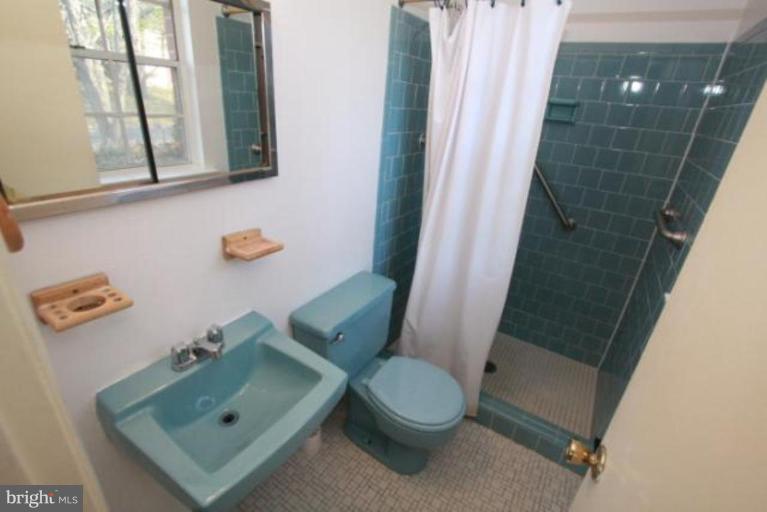 1313 Gresham Road Silver Spring, MD 20904 - Photo 16 of 28 a bathroom with a sink and a toilet