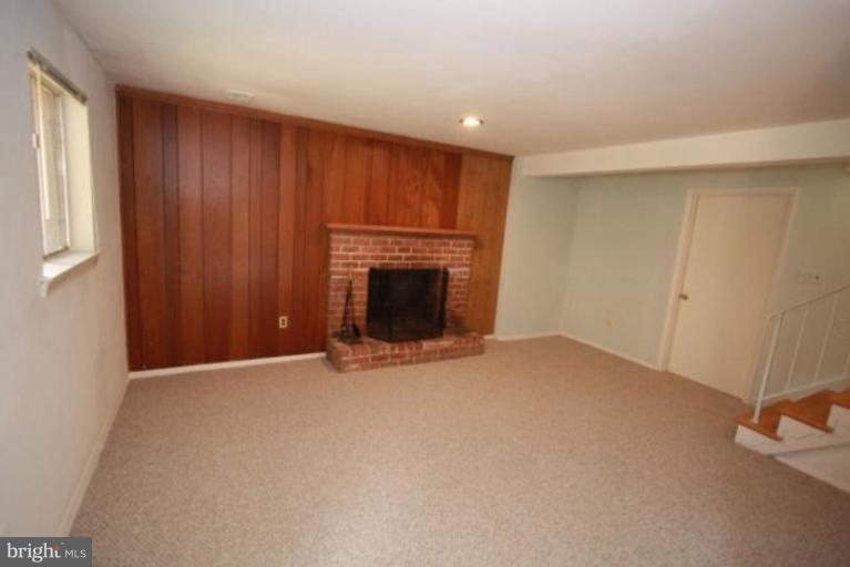 1313 Gresham Road Silver Spring, MD 20904 - Photo 3 of 28 an empty room with fireplace