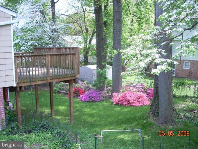 1313 Gresham Road Silver Spring, MD 20904 - Photo 27 of 28 a view of a deck with a garden