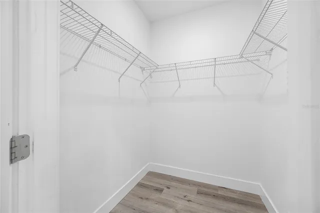 a view of a room with racks on the wall