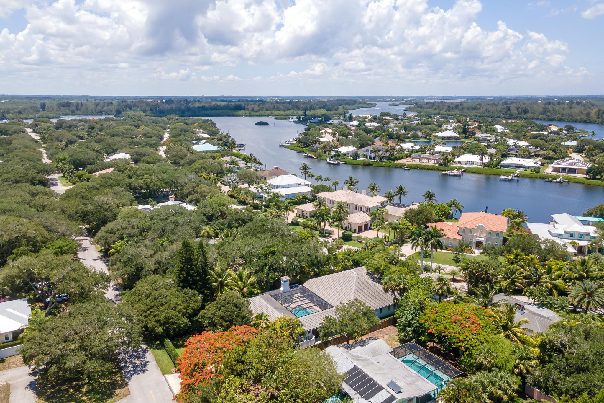 544 Live Oak Road Vero Beach, FL 32963 - Photo 52 of 55 an aerial view of a house with a lake view